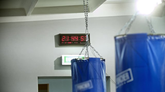 A timer on the wall in the gym