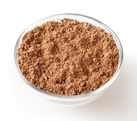Uncooked cacao powder in glass bowl isolated on white background with clipping path
