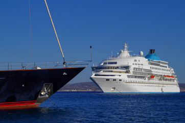 Classic small Celestyal Cruises cruiseship or cruise ship liner Celestyal Crystal anchored on blue...