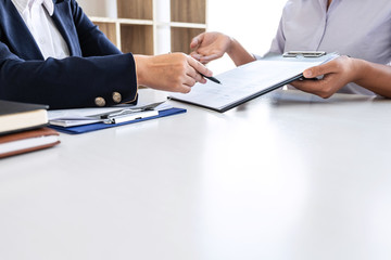 Businesswoman interview consider a resume conversation during about profile of candidate of conducting a job interview listen to answers while sitting at the working meeting in office