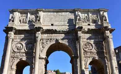 Fototapeta na wymiar Arch of Constantine or Arco di Constantino, the largest Roman triumphal arch. Rome, Italy.