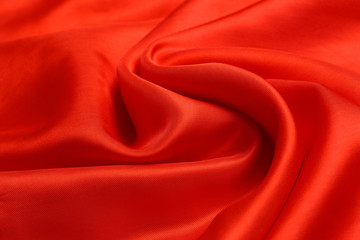 expensive fabric texture. abstract background with soft waves. Smooth elegant red silk or satin luxury cloth