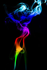 Fototapeta premium Colored smoke on black background 
