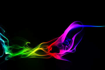 Colored smoke on black background	