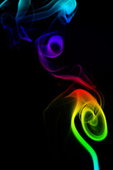 Colored smoke on black background	