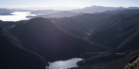 Swamp of San Anton with sea of clouds and mountains of Navarra