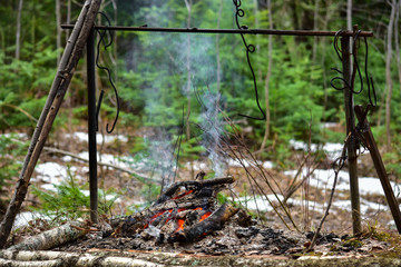 Cooking at the stake, in nature. Universal stand for cooking at the stake.