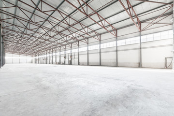 Interior of empty warehouse or garage in white colors