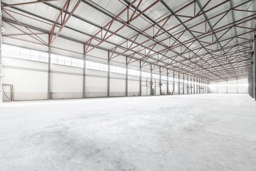 Interior of empty warehouse or garage in white colors