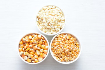 grains of natural corn in containers
