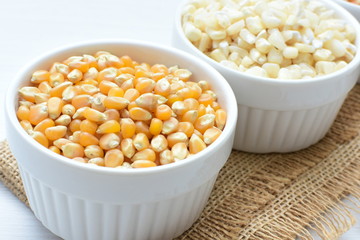 grains of natural corn in containers