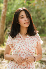 Potrait of beauty asian woman black long hair happy in white dress
