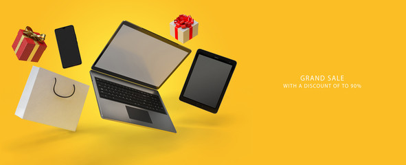 Online shopping concept desktop with computer, table, shopping bags, smartphone present box 3d rendering