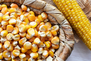 grains of natural corn in containers