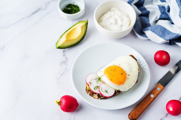 Radish avocado and egg avocado  rye sandwiches