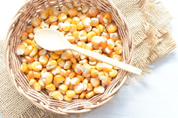 grains of natural corn in containers