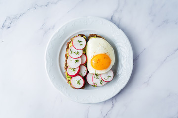 Radish avocado and egg avocado  rye sandwiches
