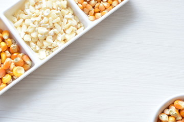 grains of natural corn in containers