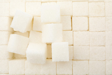 White sugar cubes texture background, close up