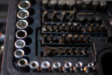 Tools for twisting nuts. Repair kit. All for car repair. A collection of nozzles of all sizes....