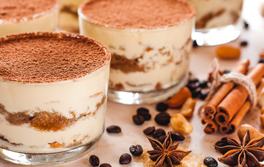 gourmet italian dessert tiramisu in a glass with cocoa