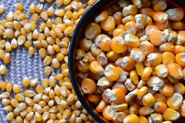 grains of natural corn in containers