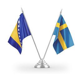 Sweden and Bosnia and Herzegovina table flags isolated on white 3D rendering