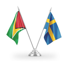 Sweden and Guyana table flags isolated on white 3D rendering