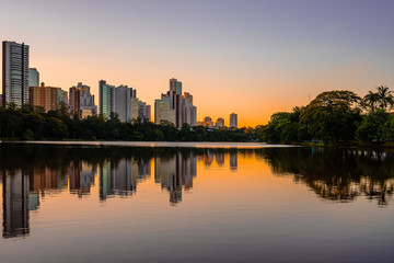 Beautiful lake of a Brazilian modern city during the sunset. Sunset at Igapo lake, Londrina PR Brazil.