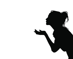 Pretty girl sending air kiss black silhouette isolated on white background.Woman profile stencil drawing.Beautiful lady vector illustration .Wall print.Vinyl decal.Valentine's day decoration element.