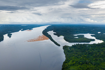 Obraz premium Amazon rainforest seen from above reveals the beauty of its rivers, trees and animals. Pará, Brazil