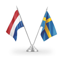 Sweden and Netherlands table flags isolated on white 3D rendering