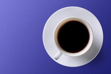  cup of coffee on a background of Phantom Blue color