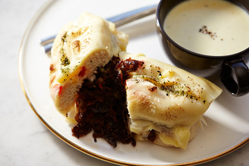 Grilled meat and cheese sandwich with potage 