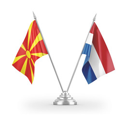 Netherlands and North Macedonia table flags isolated on white 3D rendering