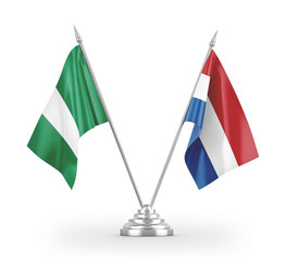 Netherlands and Nigeria table flags isolated on white 3D rendering