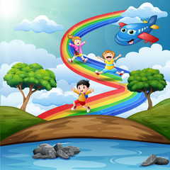 Fototapeta na wymiar Children playing over the rainbow