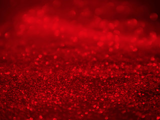 Red shiny glitter holiday beautiful background.Red glitter vintage lights background.