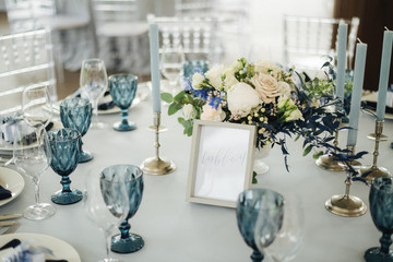 table setting with flowers in blue color