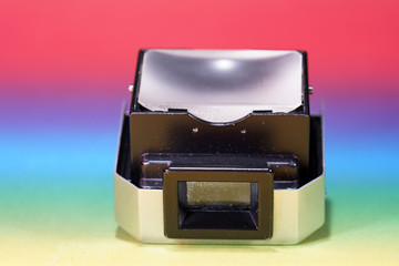 Photo glass and prisms of a disassembled camera photographed in the studio