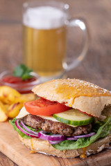 home made burger on dark wood