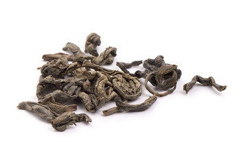 Heap of Chinese green tea, isolated on white background