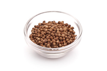 Coriander seeds, isolated on white background