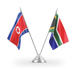 South Africa and North Korea table flags isolated on white 3D rendering
