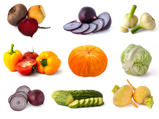 Turnips red beets onions garlic Bell peppers red tomatoes on a green sprig cabbage turnips and orange pumpkin from the autumn harvest on a white background