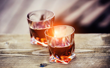 shot of whiskey wooden background