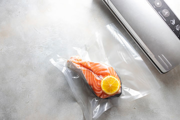 Salmon fillets in a vacuum package. Sous-vide, new technology cuisine.