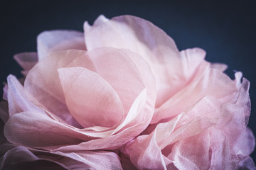 Pink petals of a Rose made of fabric