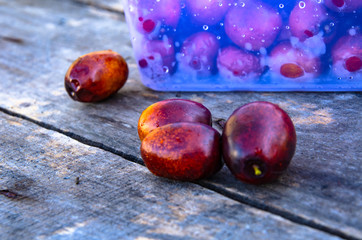 Ziziphus on old wooden boards assembled in plastic food boxes.