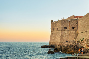 Sunset and St John Fortress in Adriatic Sea Dubrovnik